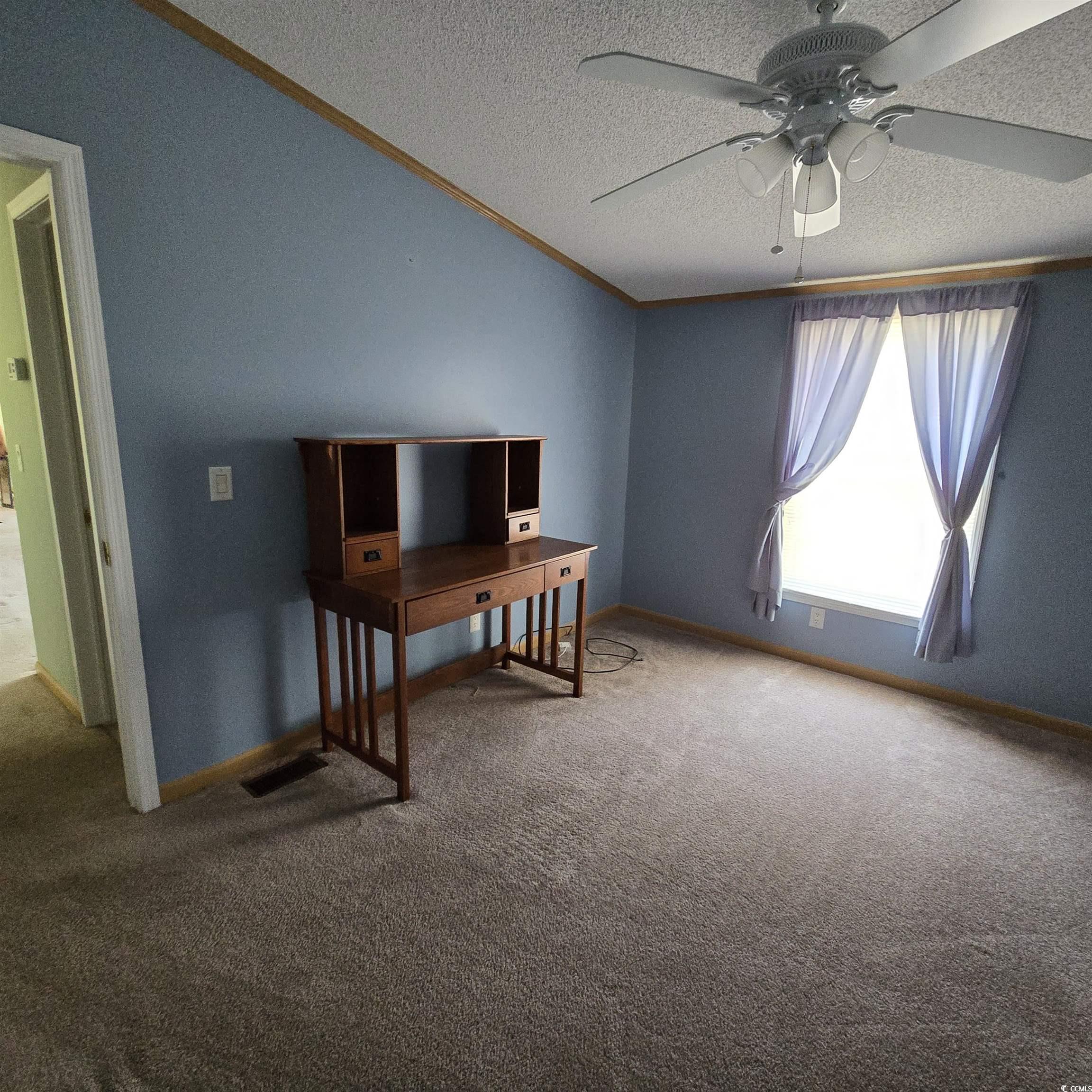 34 Talon Circle Murrells Inlet, SC 29576 - Photo 29 of 40 Unfurnished office featuring a textured ceiling, ceiling fan, carpet, and crown molding