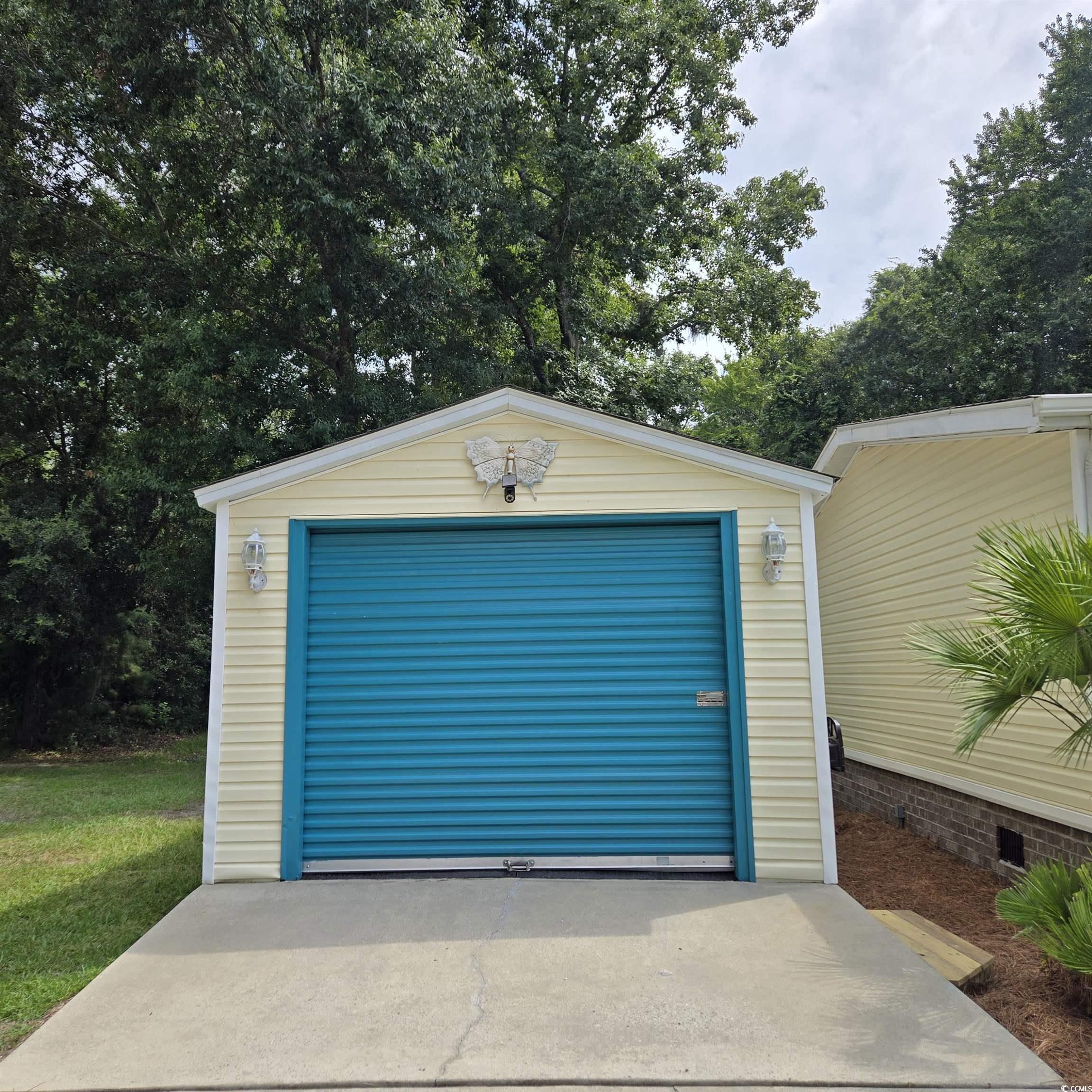 34 Talon Circle Murrells Inlet, SC 29576 - Photo 6 of 40 Detached garage with driveway
