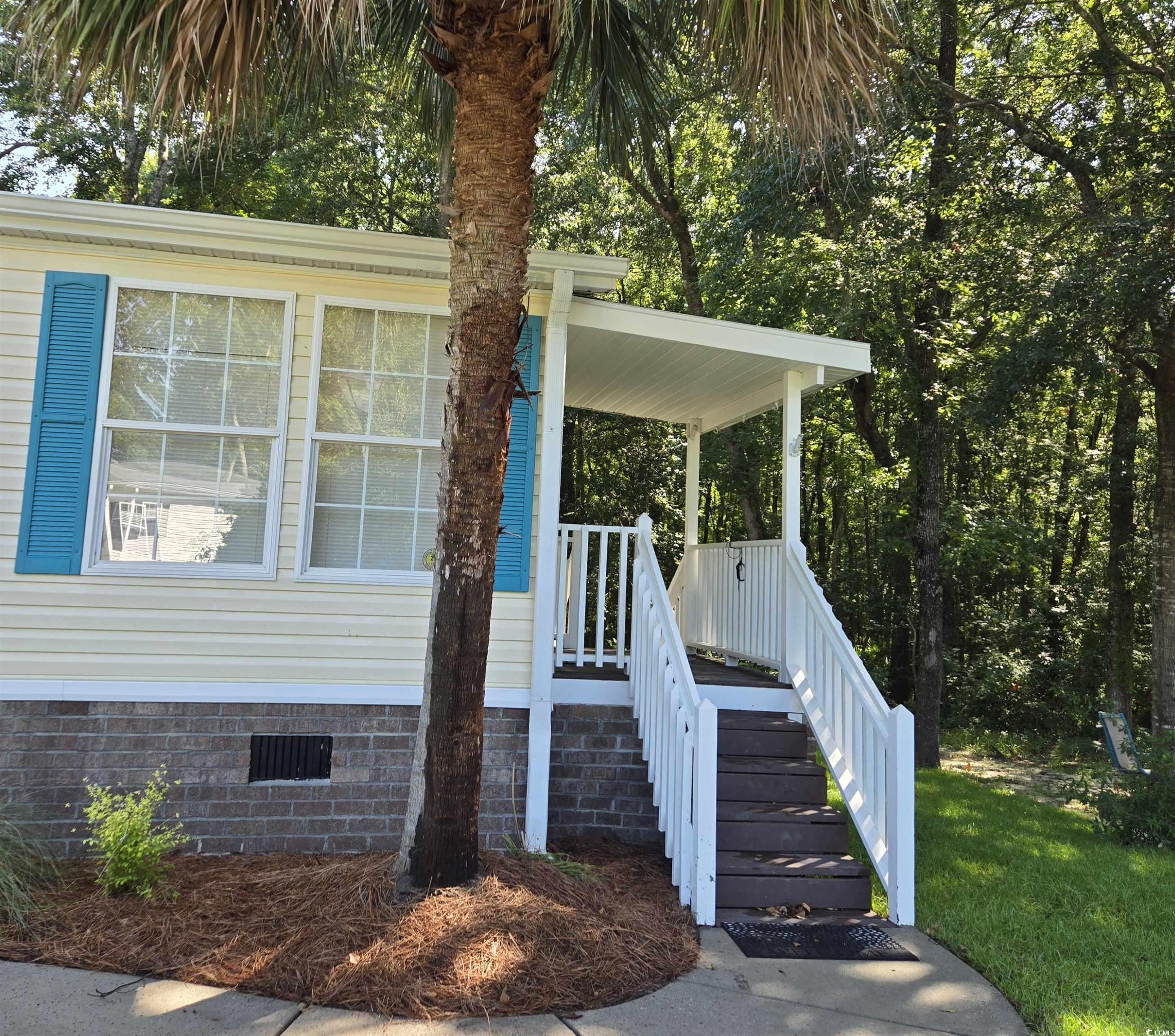 34 Talon Circle Murrells Inlet, SC 29576 - Photo 8 of 40 Property entrance with crawl space and covered porch