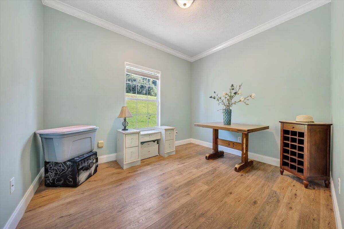 4315 Bandy Road Roanoke, VA 24014 - Photo 19 of 31 a living room with furniture and a wooden floor