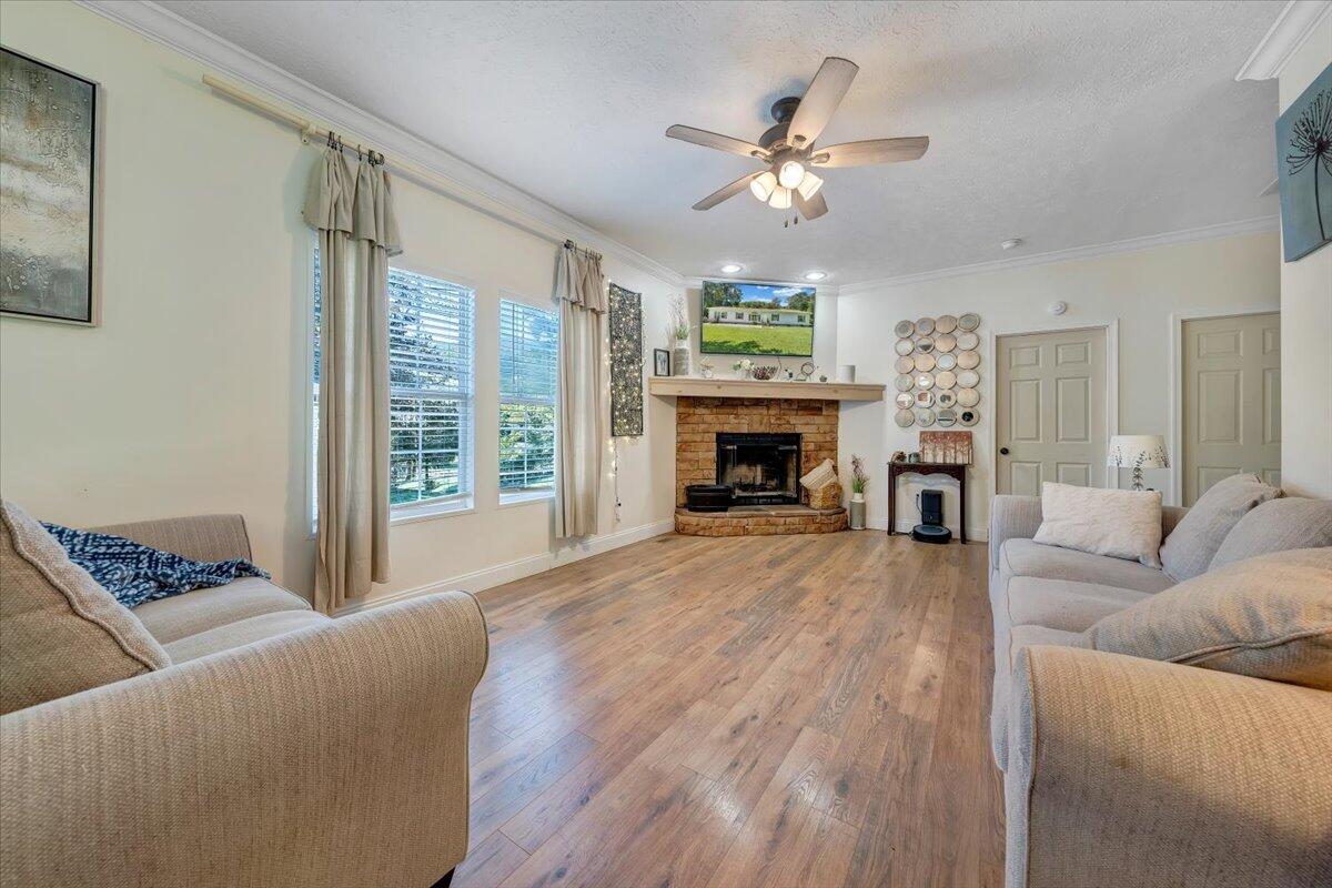 4315 Bandy Road Roanoke, VA 24014 - Photo 2 of 31 a living room with furniture and a fireplace