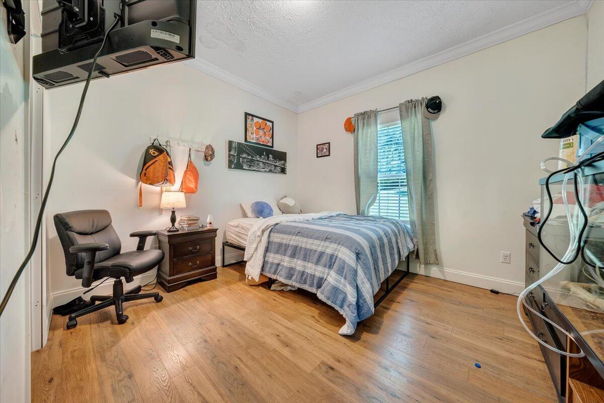 4315 Bandy Road Roanoke, VA 24014 - Photo 22 of 31 a bedroom with a bed a chair and a desk
