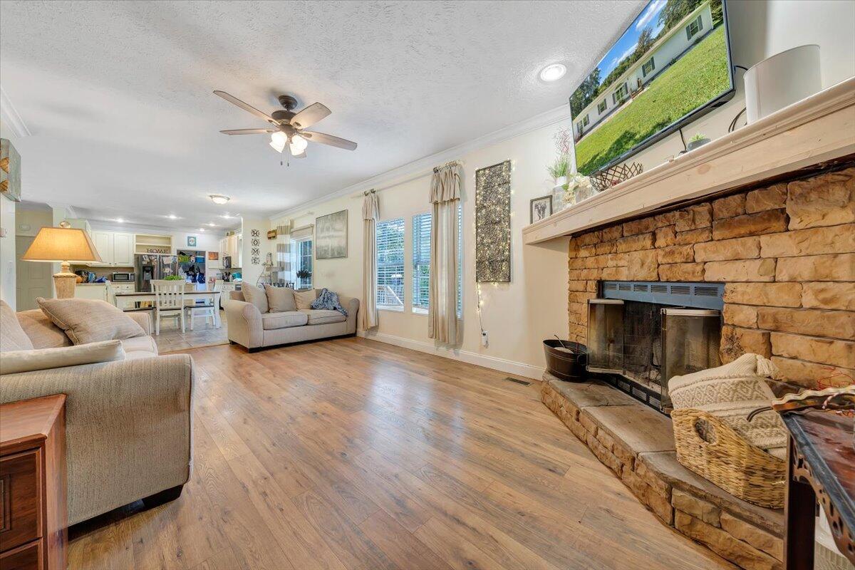 4315 Bandy Road Roanoke, VA 24014 - Photo 3 of 31 a living room with furniture and a fireplace