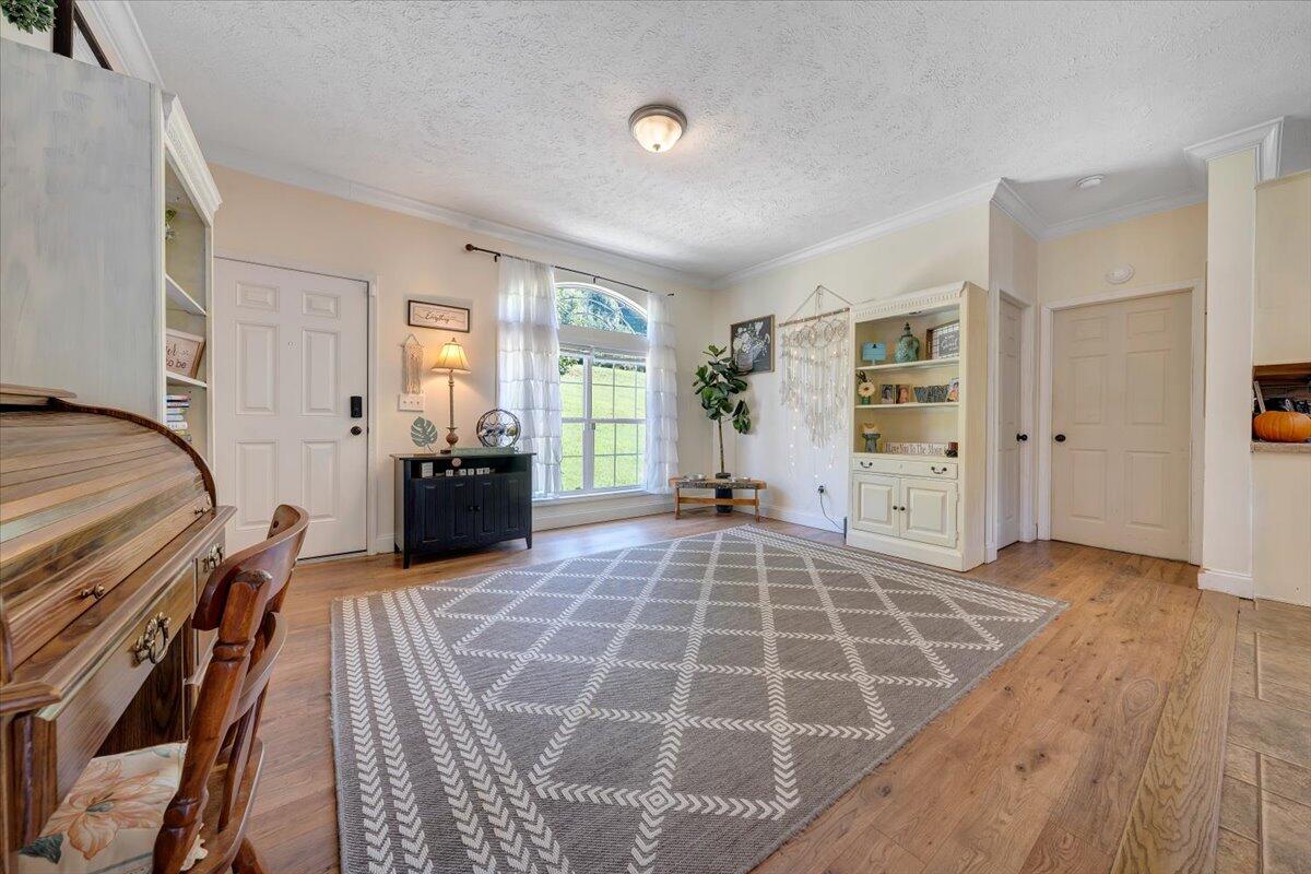 4315 Bandy Road Roanoke, VA 24014 - Photo 6 of 31 a spacious bedroom with a bed and wooden floor