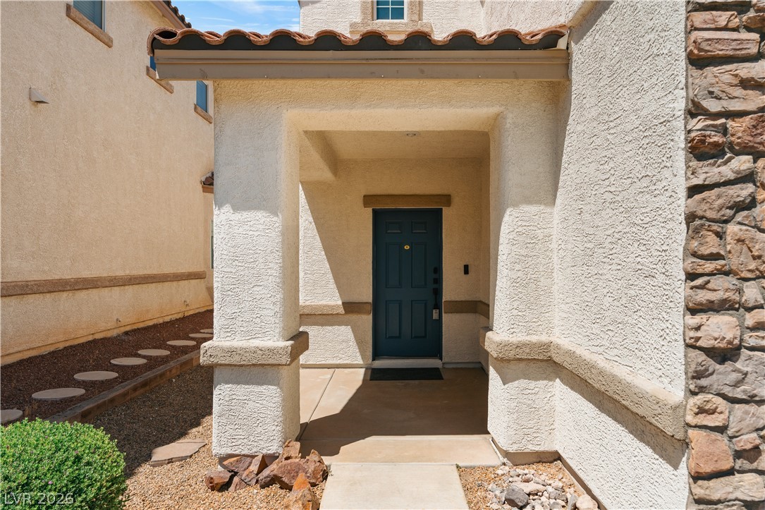 1328 Spice Ridge Court Henderson, NV 89012 - Photo 3 of 51 Welcome home to this inviting entrance with charming architectural details.