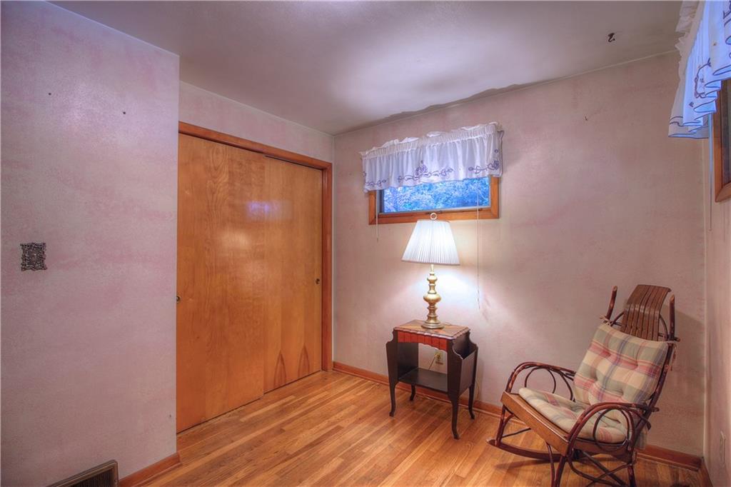 306 Brewer Road Rochester, PA 15074 - Photo 12 of 25 Bedroom 2 with a double closet and hardwood floors.