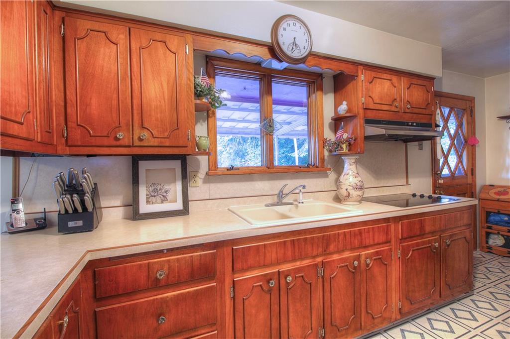 306 Brewer Road Rochester, PA 15074 - Photo 6 of 25 Beautiful original teak cabinetry with ample storage space.