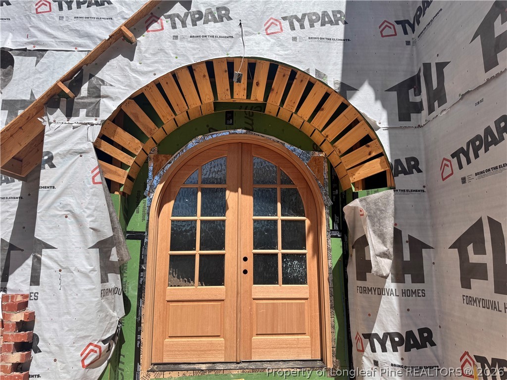 45 Beckett Ridge Pinehurst, NC 28374 - Photo 2 of 50 a front view of a building with entryway