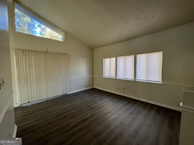a view of an empty room and window