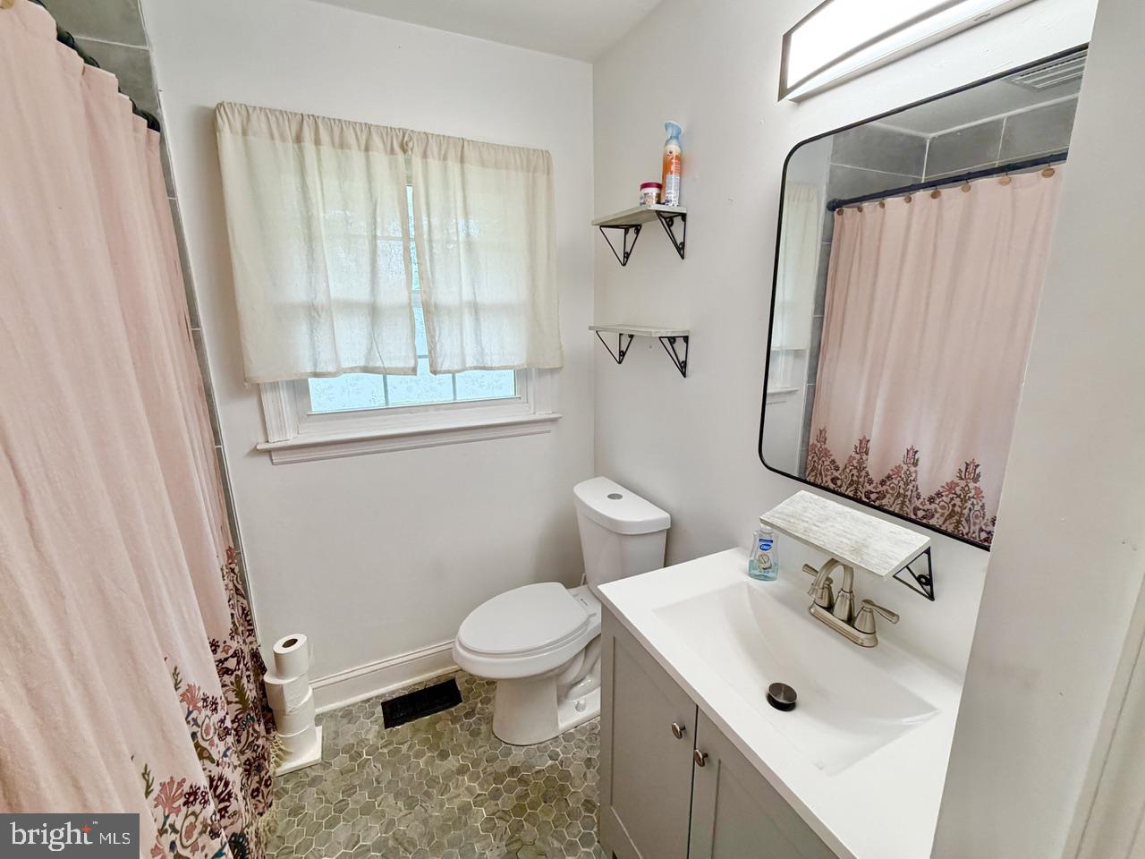 2413 Shelburn Road Millville, NJ 08332 - Photo 25 of 41 a bathroom with a sink toilet and shower