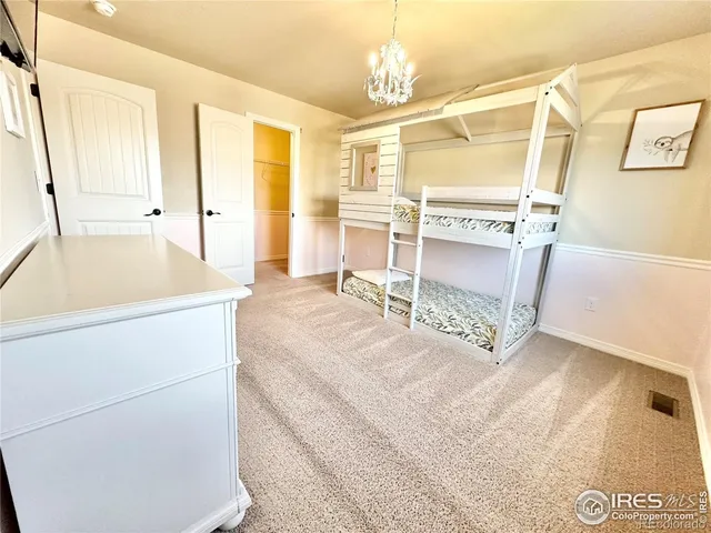a bathroom with a bathtub and a window