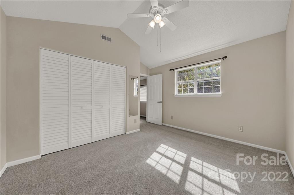 12102 Henderson Hill Road Huntersville, NC 28078 - Photo 19 of 31 a view of an empty room with a window