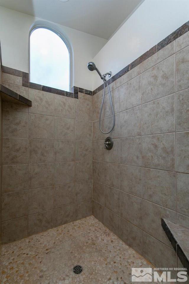 14425 Ghost Rider Drive Reno, NV 89511 - Photo 20 of 37 a bathroom with a shower