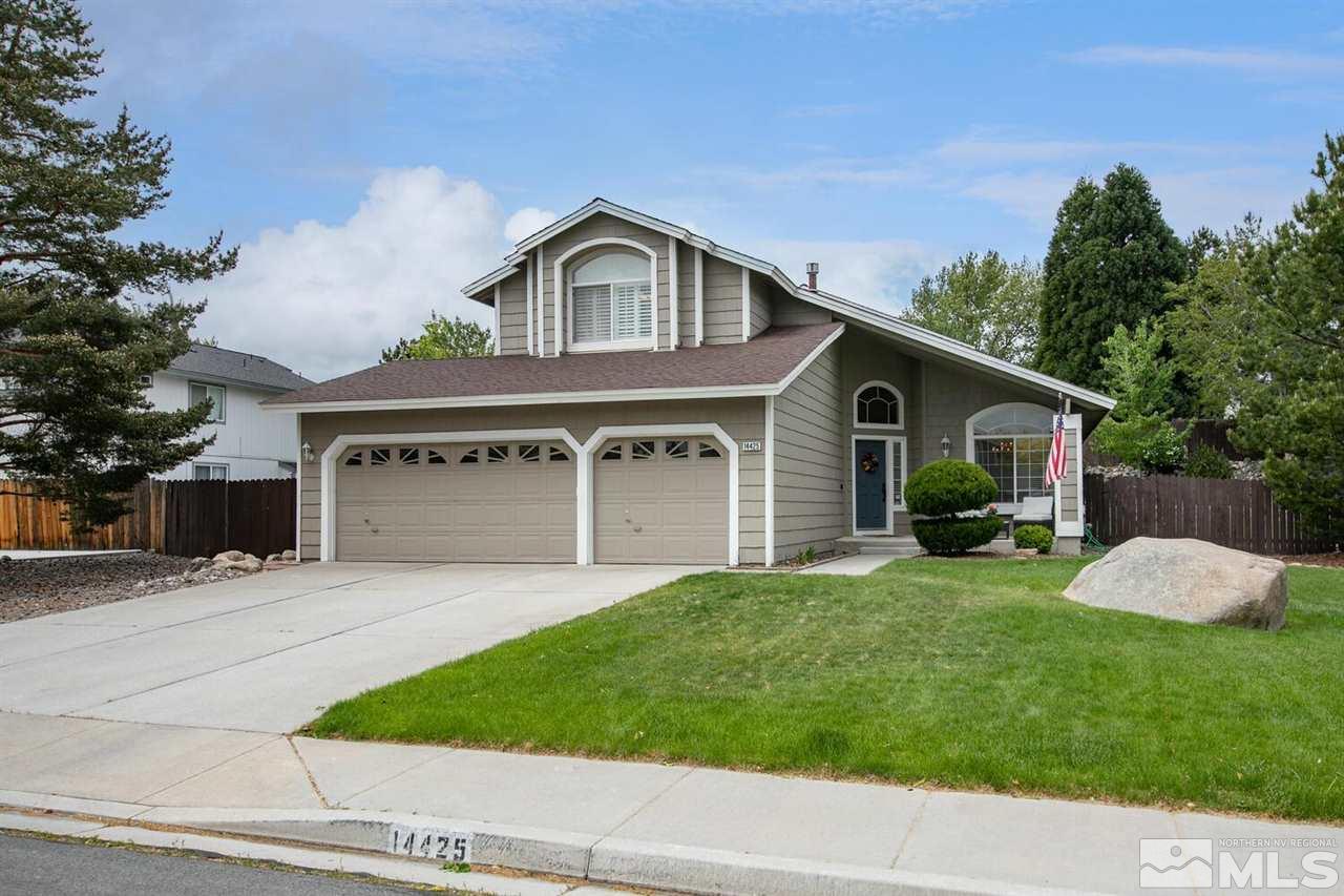 14425 Ghost Rider Drive Reno, NV 89511 - Photo 2 of 37 a front view of house with yard and outdoor seating