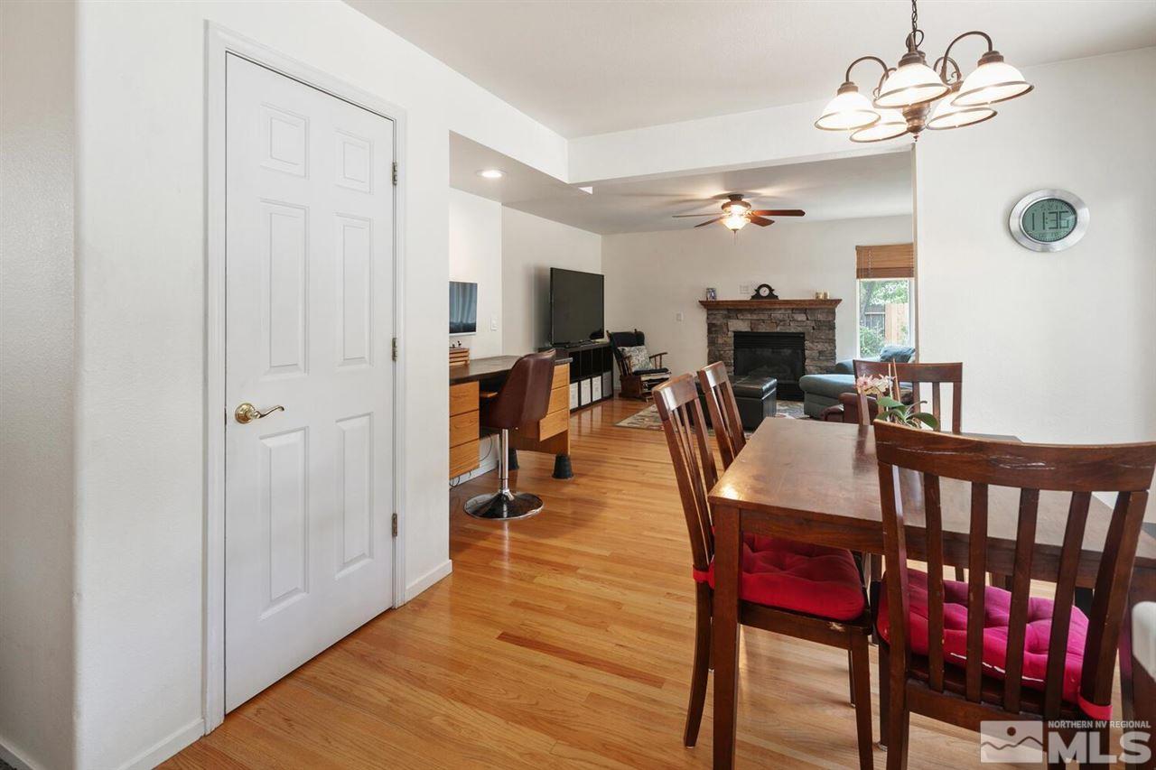 14425 Ghost Rider Drive Reno, NV 89511 - Photo 9 of 37 a view of a dining room with furniture