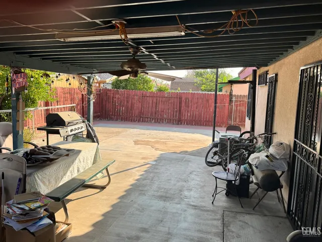 a view of a swimming pool with a patio