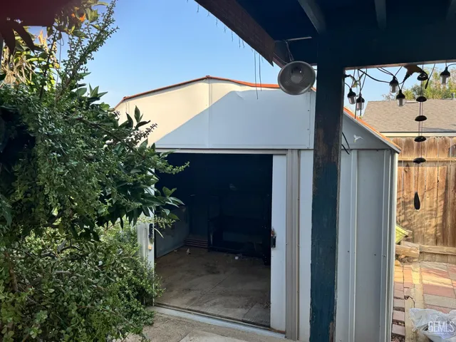 a yellow house with outdoor space