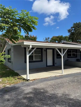 a view of a house with a garage