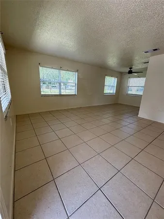 a view of a room with windows