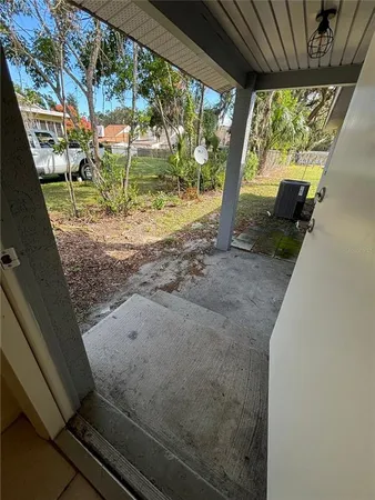 a view of backyard from a balcony