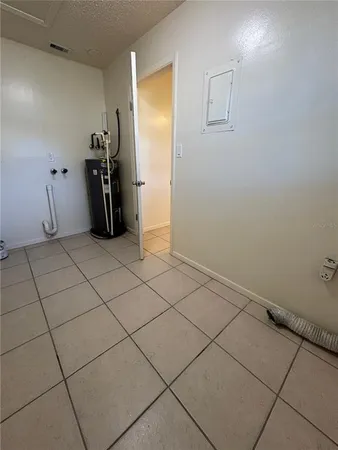 a view of a livingroom and entryway