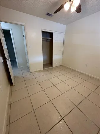 a view of a livingroom and entryway