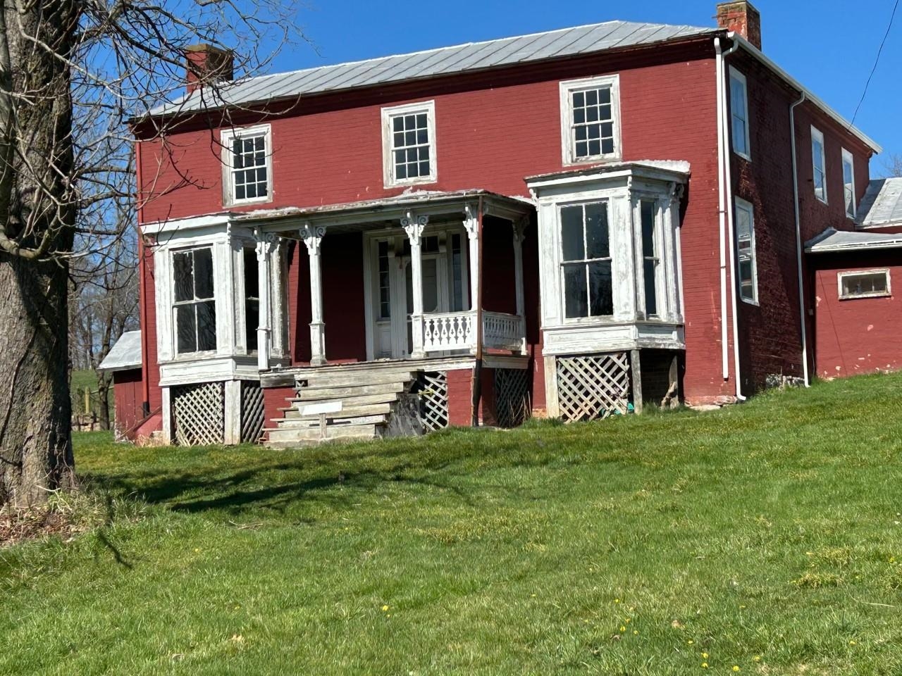 5787 Borden Grant Trail Raphine, VA 24472 - Photo 1 of 41 front view of a brick house with a yard