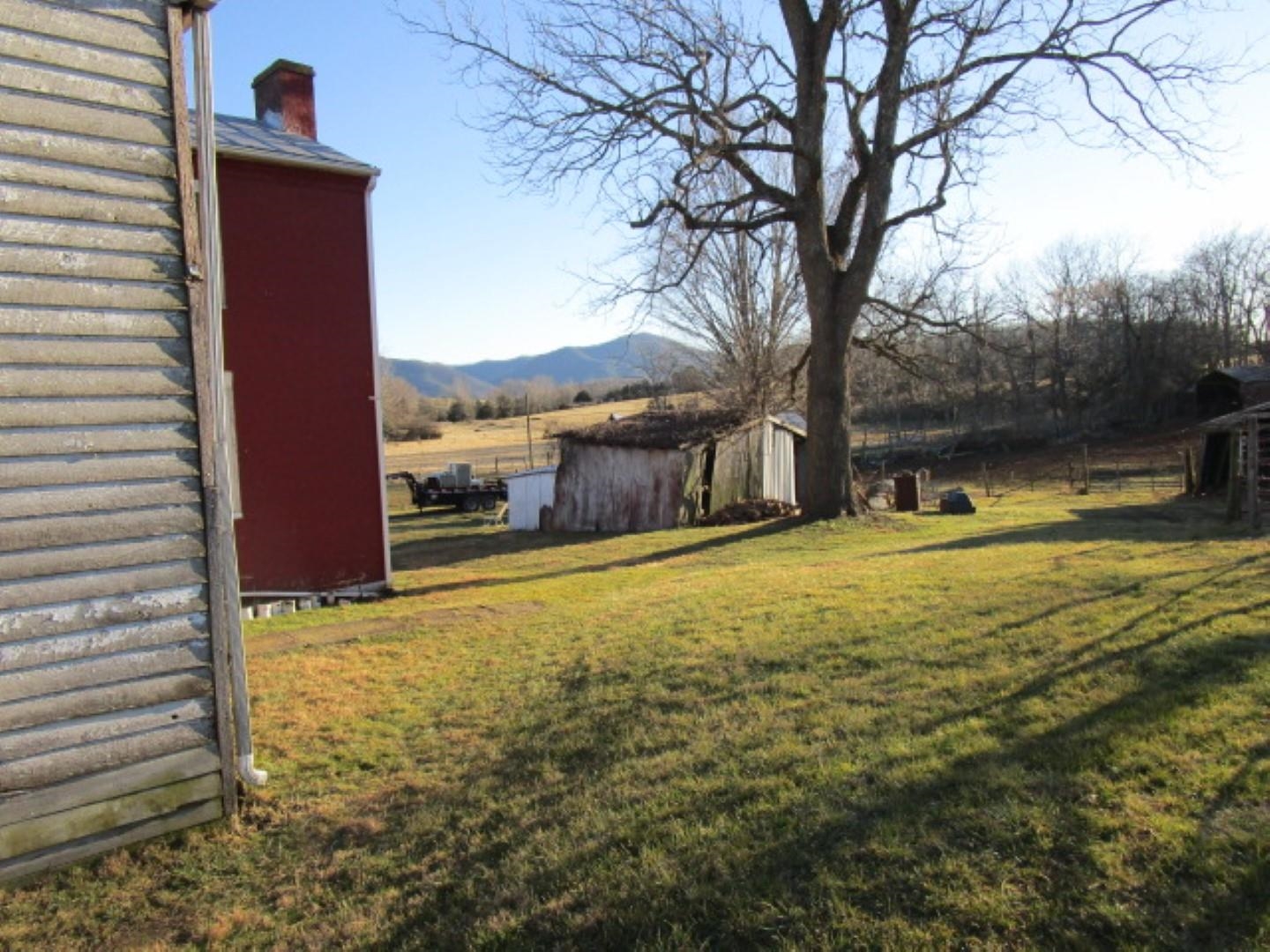 5787 Borden Grant Trail Raphine, VA 24472 - Photo 13 of 41 a view of an house with backyard space and balcony