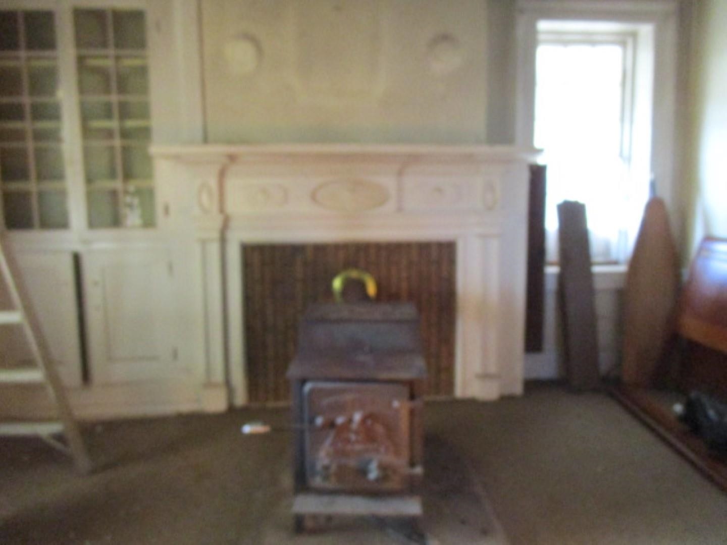 5787 Borden Grant Trail Raphine, VA 24472 - Photo 16 of 41 a living room with a fireplace
