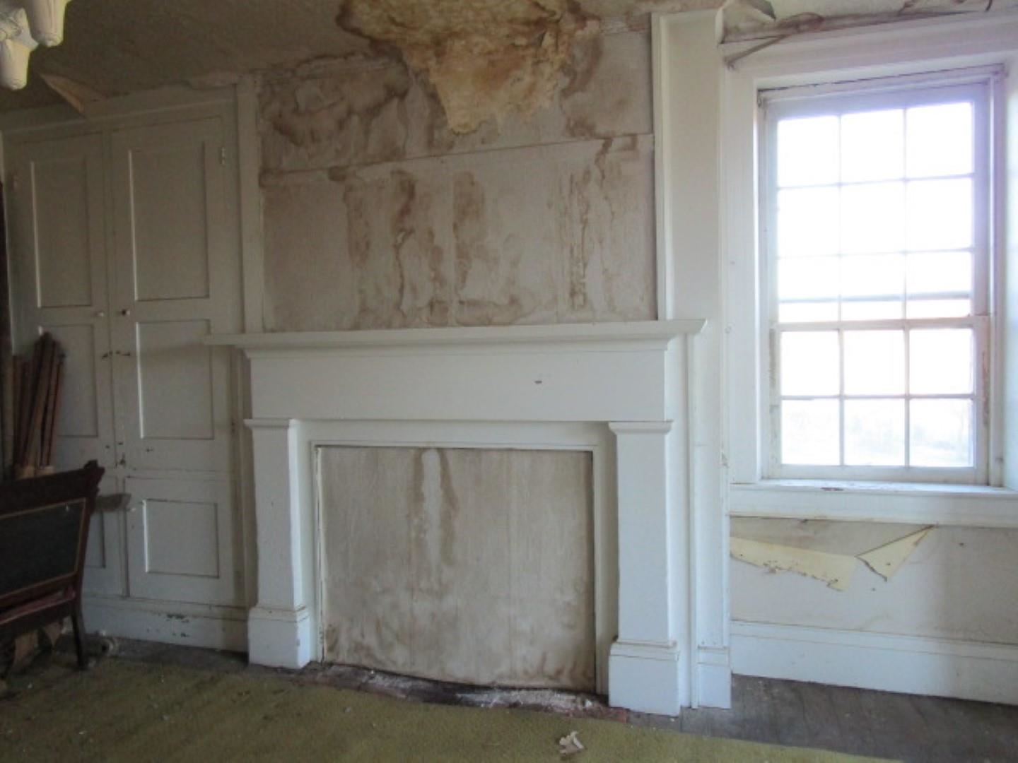 5787 Borden Grant Trail Raphine, VA 24472 - Photo 2 of 41 a view of an empty room with a fireplace and a window