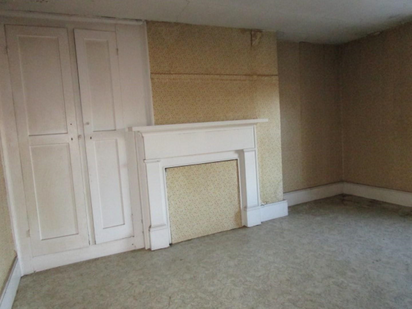 5787 Borden Grant Trail Raphine, VA 24472 - Photo 28 of 41 a view of an empty room with a fireplace
