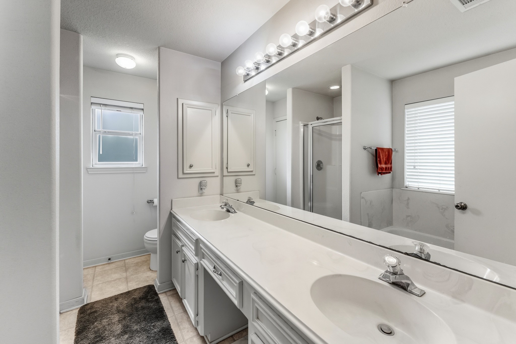691 Bishop Road Huntsville, TX 77320 - Photo 17 of 32 a bathroom with a sink and a mirror