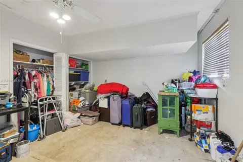 a view of a patio with a table and chairs