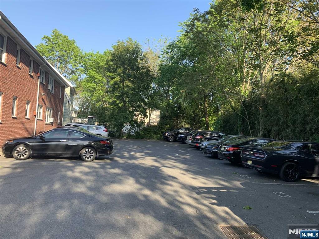 171-183 Fort Lee Road, Unit 1731C Teaneck, NJ 07666 - Photo 4 of 15 a view of street with parked cars
