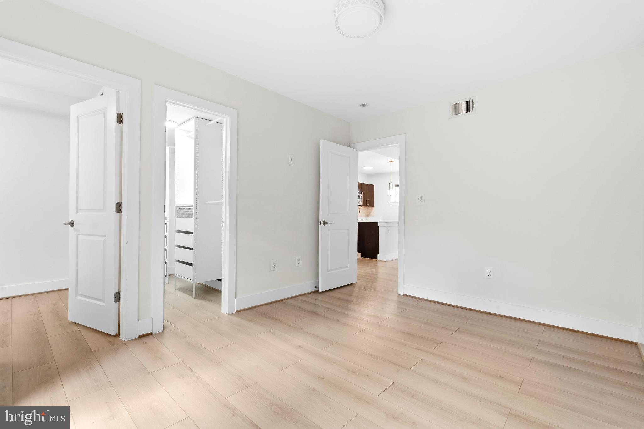 4226 7th Street Northwest, Unit 101 Washington, DC 20011 - Photo 19 of 23 wooden floor in an empty room