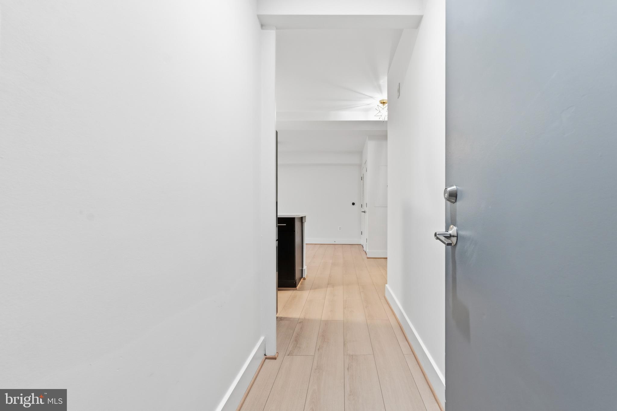 4226 7th Street Northwest, Unit 101 Washington, DC 20011 - Photo 20 of 23 a view of a room with a hallway