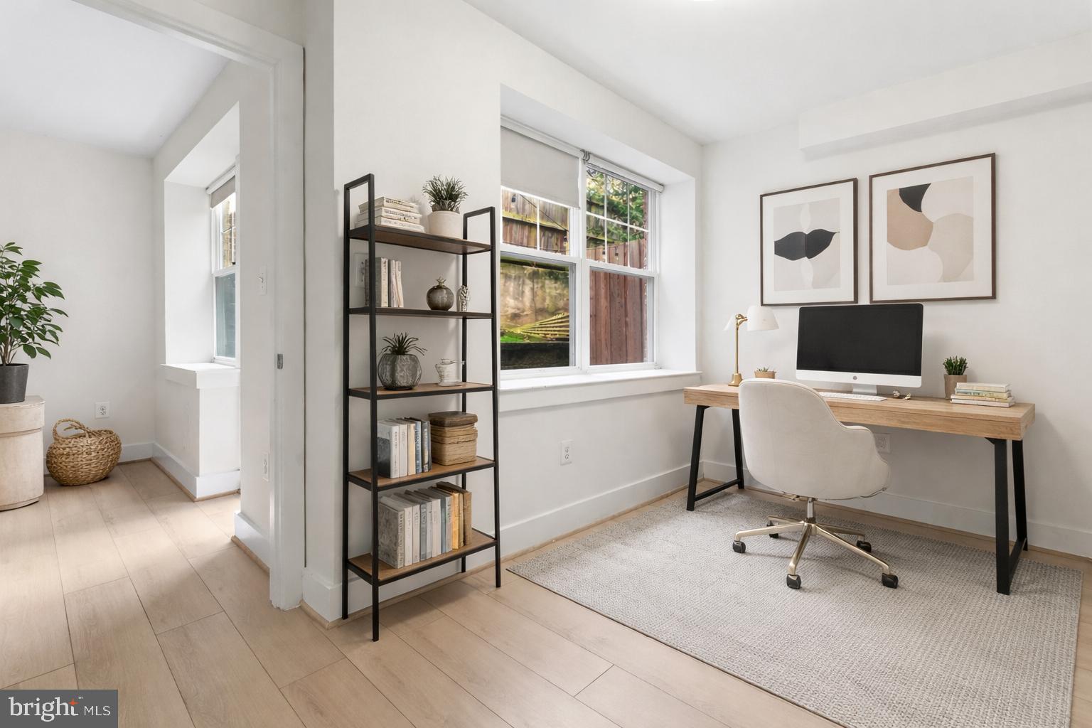 4226 7th Street Northwest, Unit 101 Washington, DC 20011 - Photo 8 of 23 a workspace with furniture and window