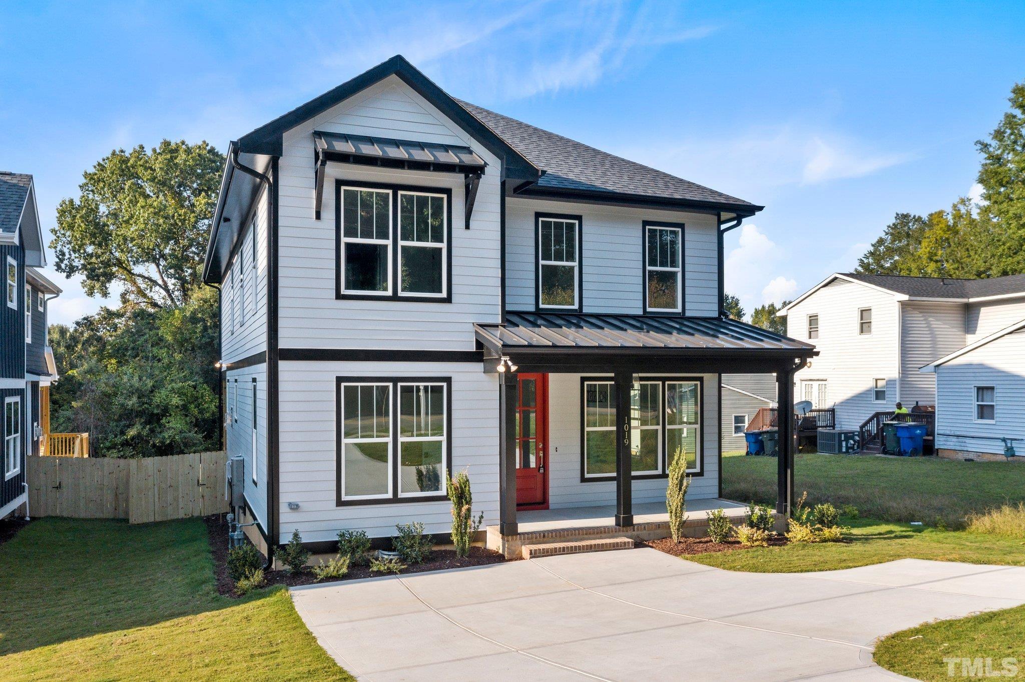 1019 Glascock Street Raleigh, NC 27610 - Photo 2 of 30 a front view of a house with a yard