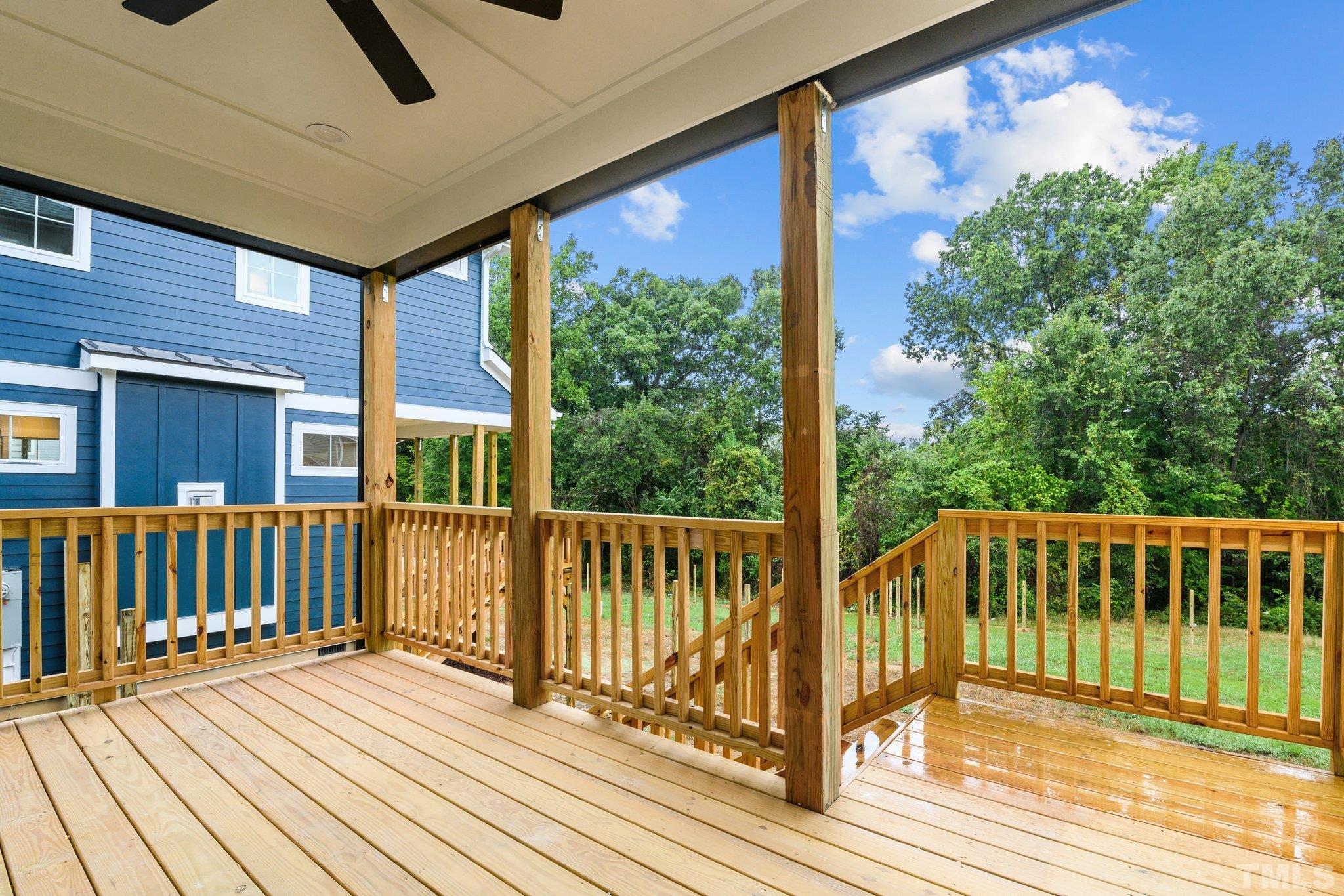 1019 Glascock Street Raleigh, NC 27610 - Photo 15 of 30 a view of a balcony with wooden floor