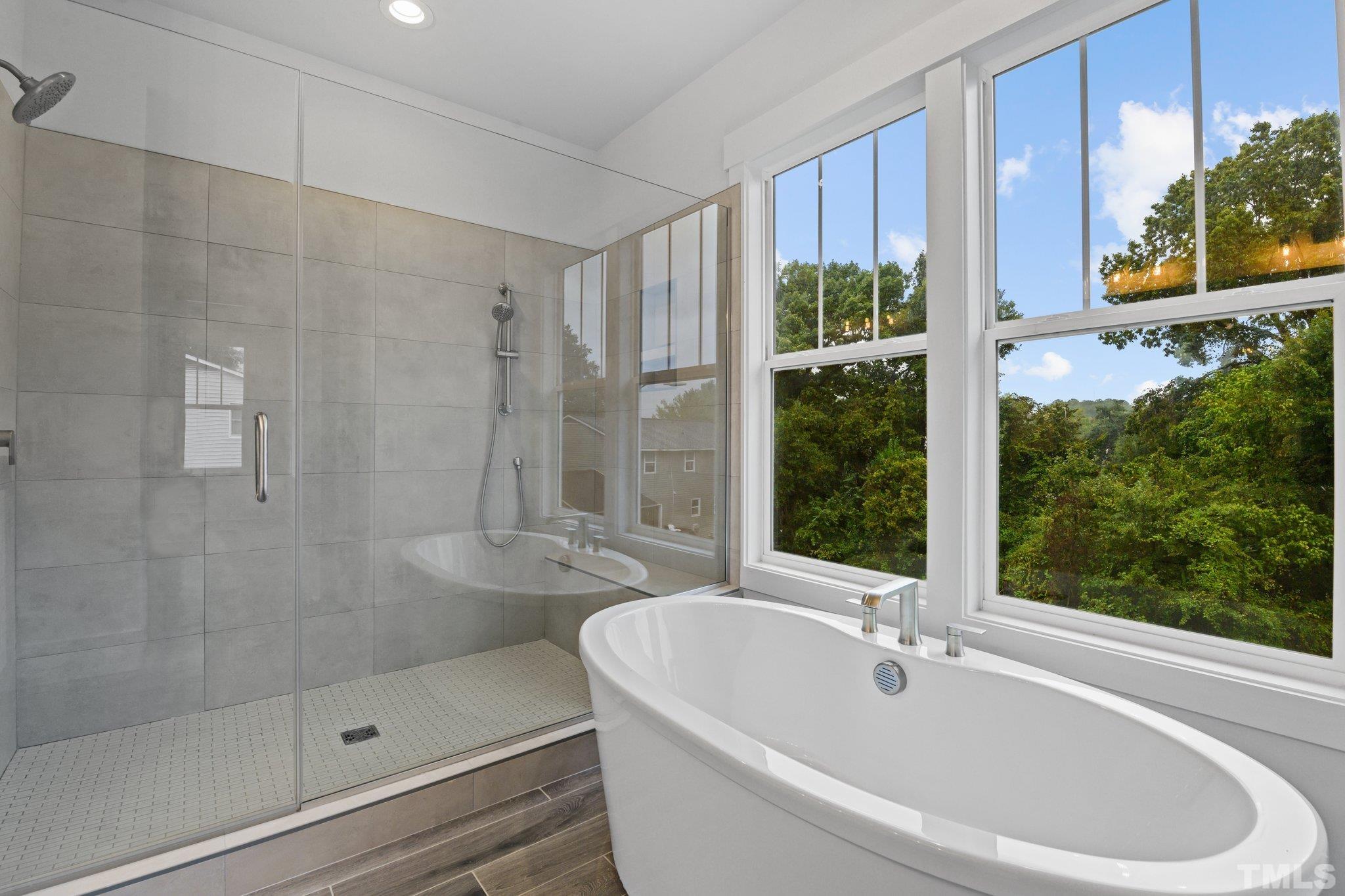 1019 Glascock Street Raleigh, NC 27610 - Photo 26 of 30 a bathroom with a bathtub and shower