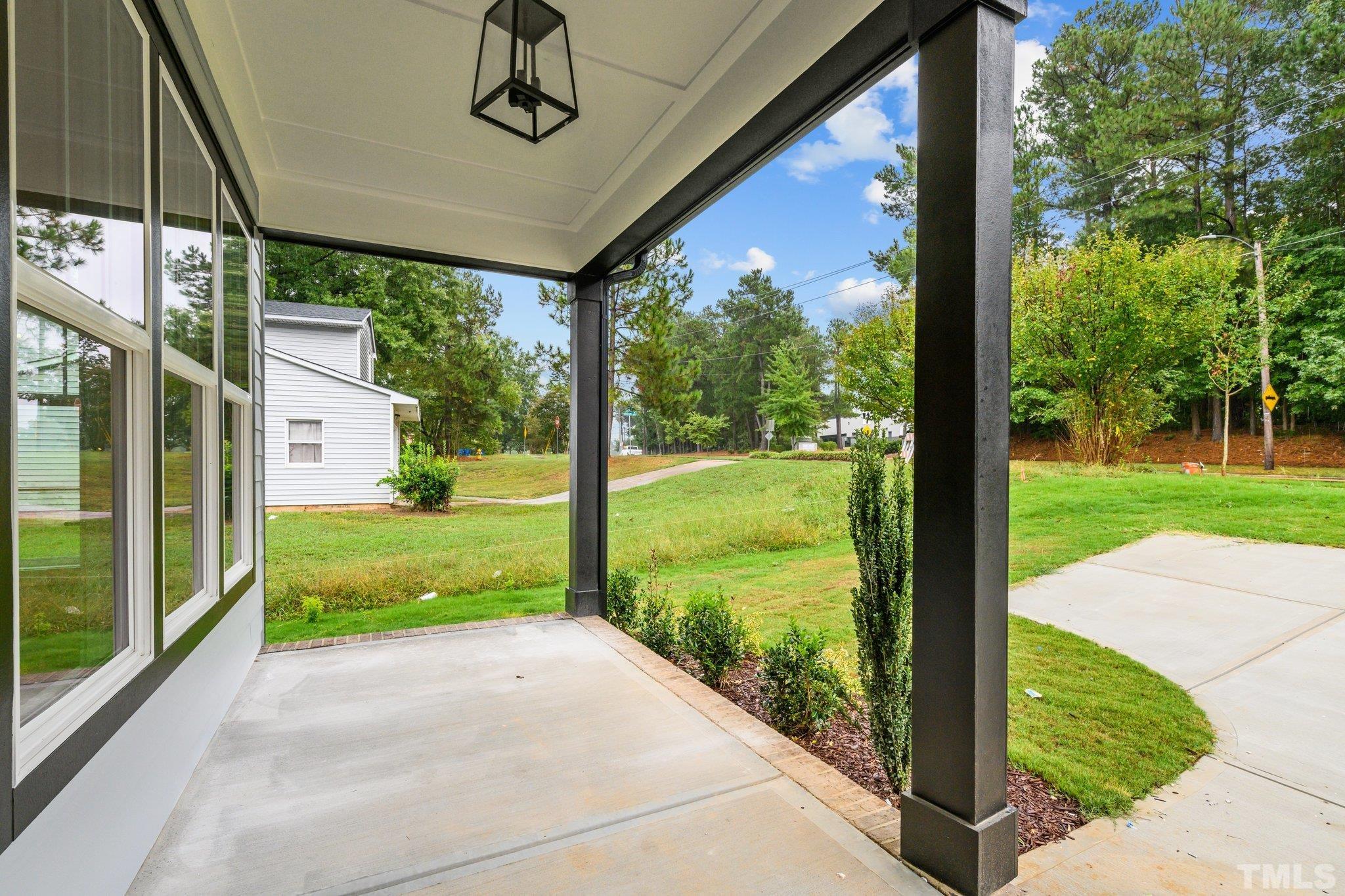 1019 Glascock Street Raleigh, NC 27610 - Photo 5 of 30 a view of a porch with garden
