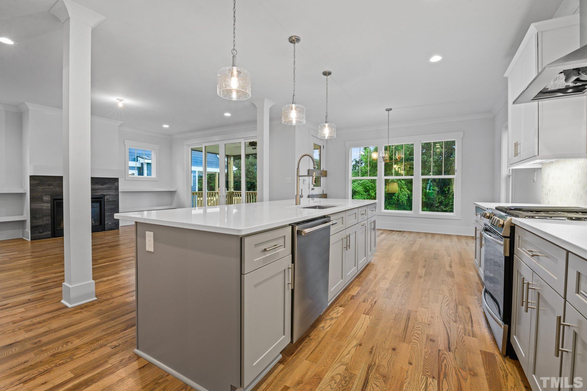 1019 Glascock Street Raleigh, NC 27610 - Photo 8 of 30 a bathroom with a sink a large mirror and a window