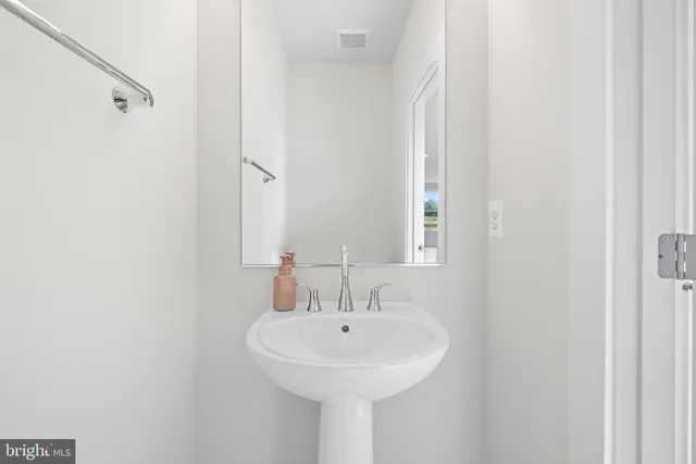 a view of a house with wooden deck