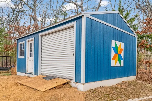 a view of a backyard of a house