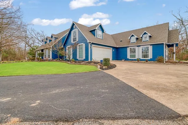 a view of balcony with furniture and wooden floor