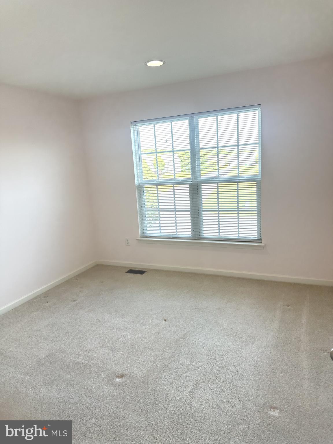 211 Arrowood Drive Smyrna, DE 19977 - Photo 13 of 22 an empty room with a window