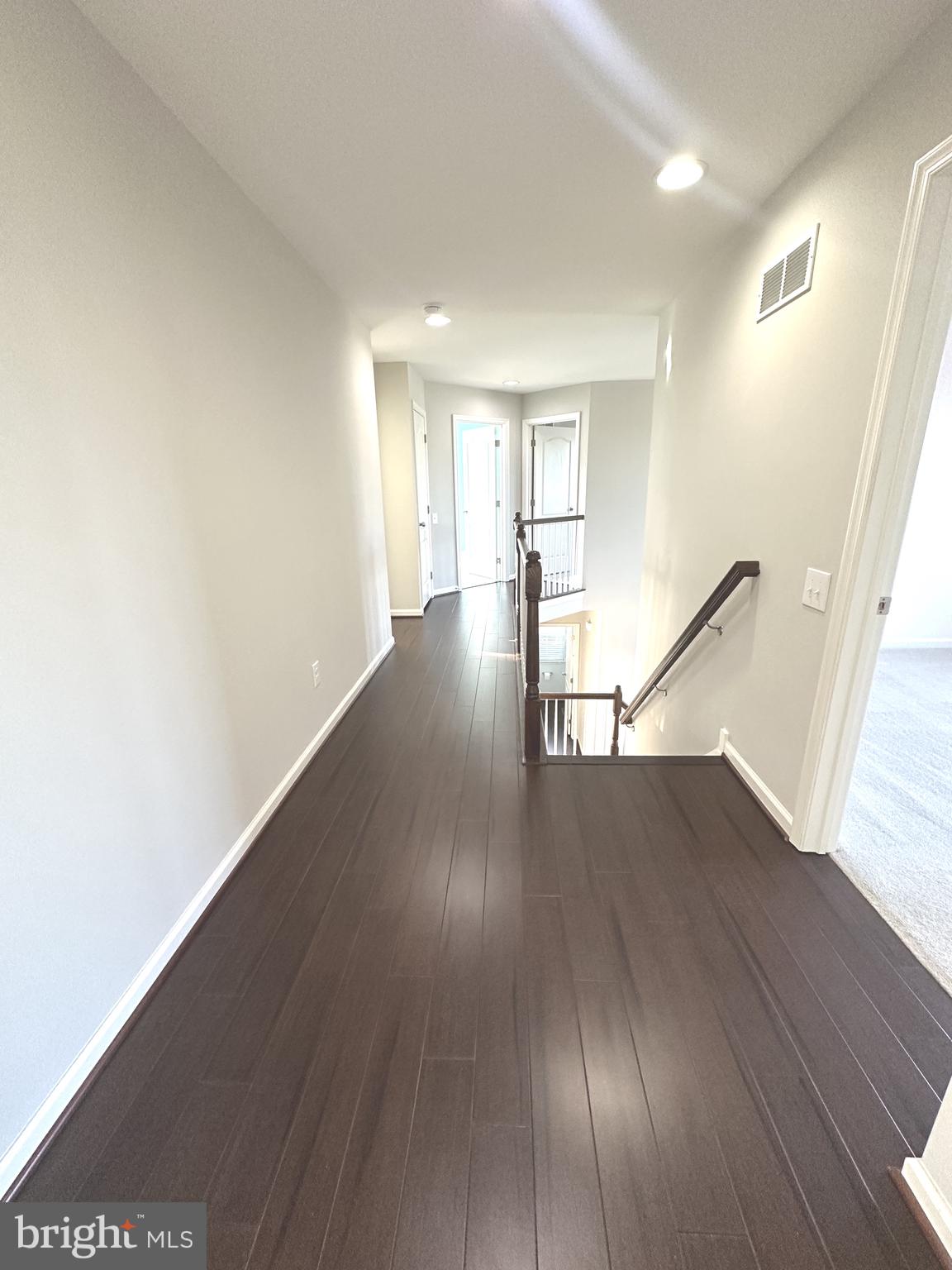 211 Arrowood Drive Smyrna, DE 19977 - Photo 18 of 22 a view of empty room with wooden floor