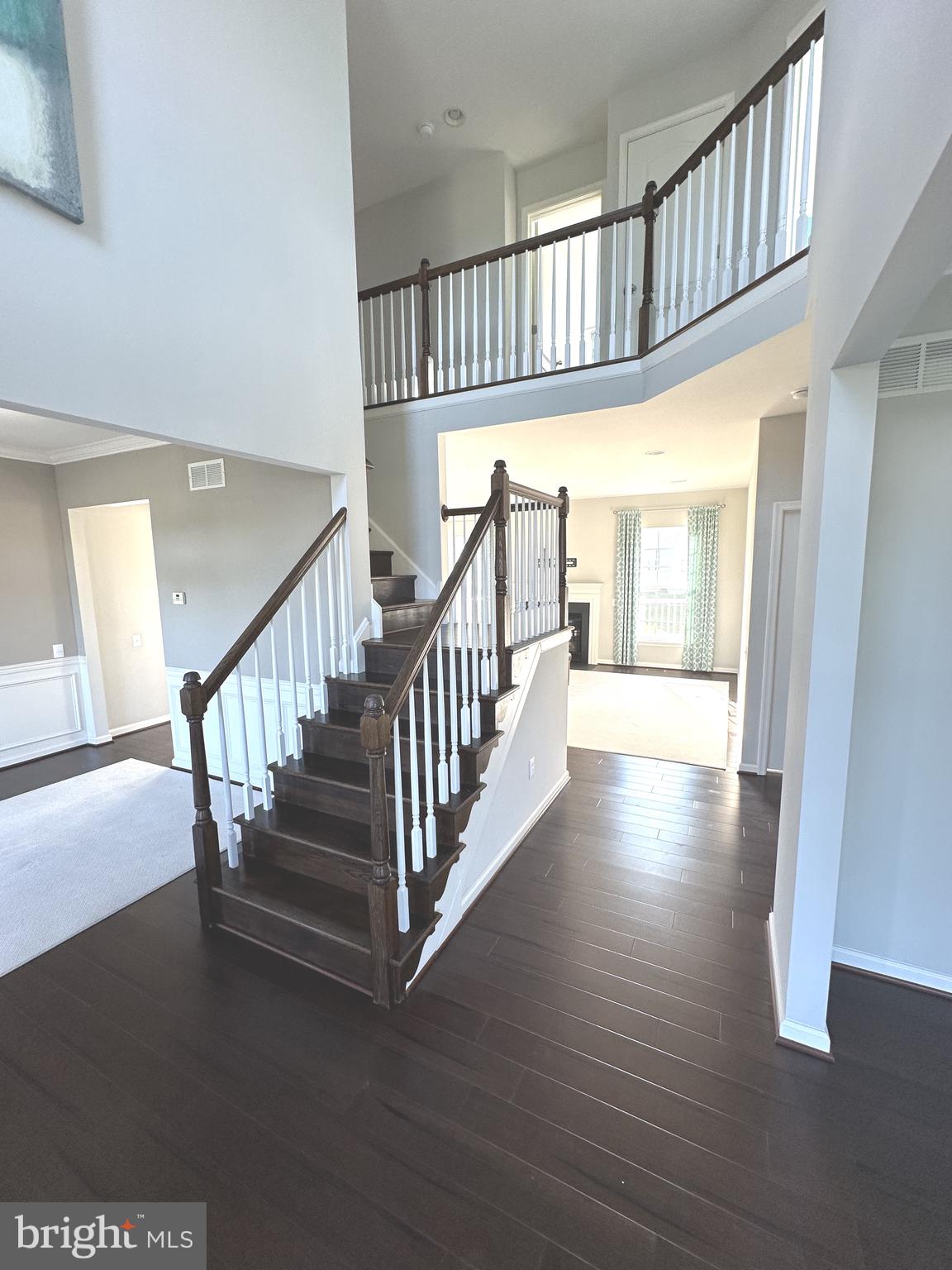 211 Arrowood Drive Smyrna, DE 19977 - Photo 2 of 22 a view of an entryway wooden floor