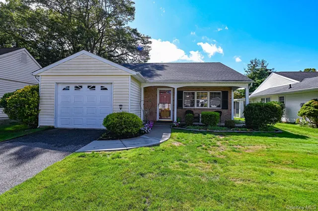 a view of a house with garden