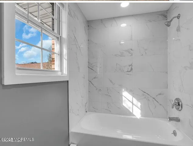 a bathroom with a bathtub